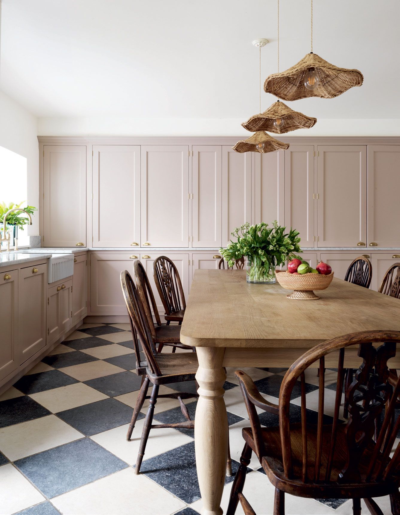 Image may contain Furniture Chair Room Indoors Flooring Dining Room Wood Interior Design Dining Table and Table