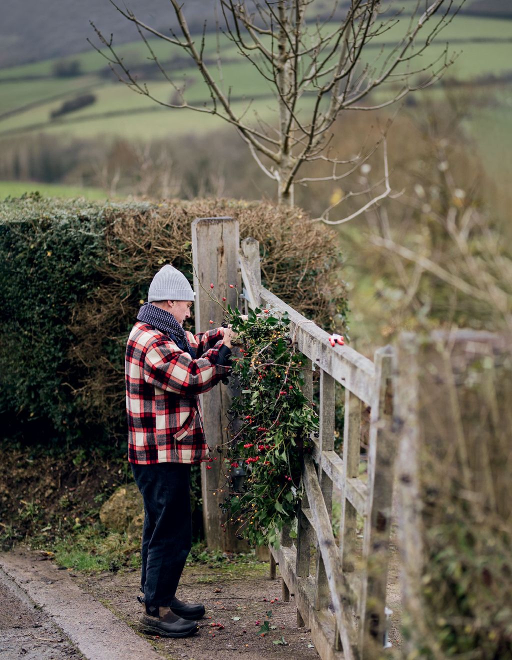 nbspHuw making a wreath for the gate.