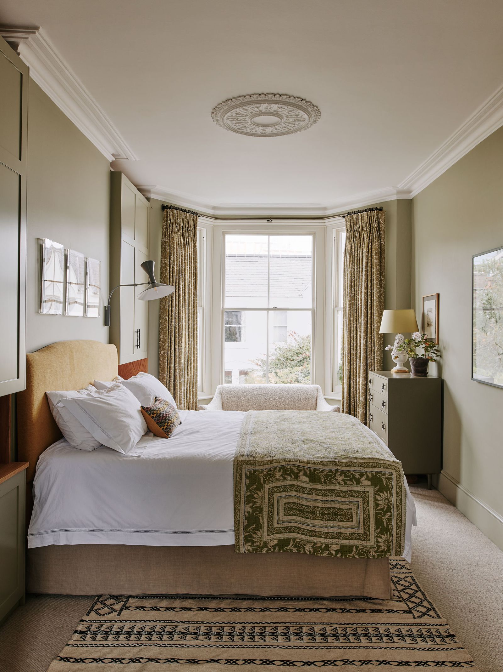 Image may contain Furniture Indoors Room Bedroom Interior Design Bed and Rug