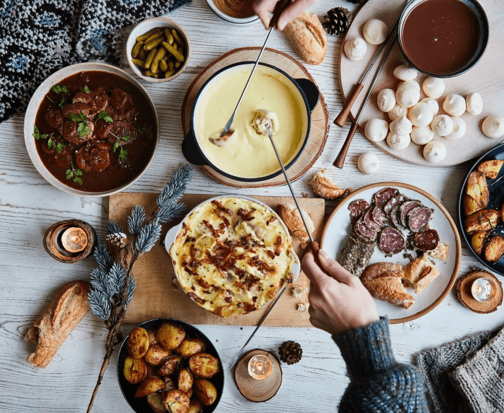 Image may contain Food Pizza Fondue Dish Meal and Stew