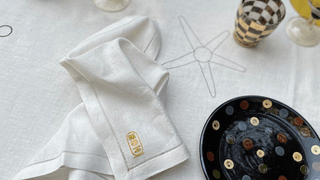 Image may contain Home Decor Glass and Linen