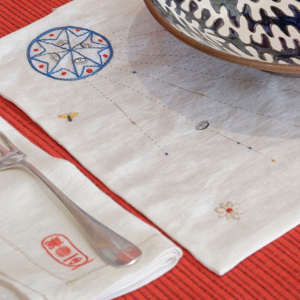 Image may contain Pattern Rug Home Decor Embroidery Clothing and Apparel