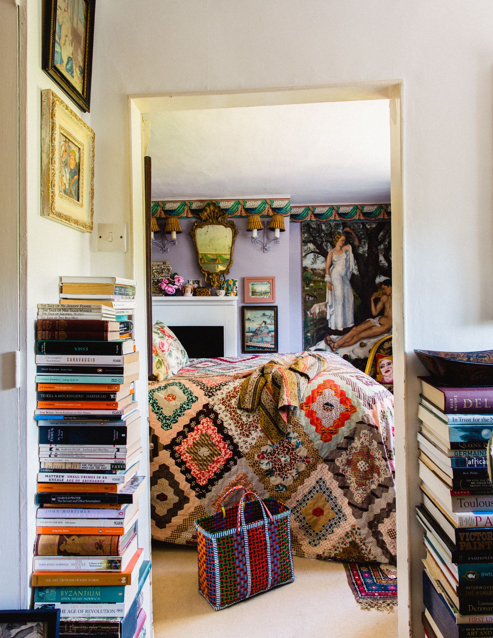 Image may contain Shelf Furniture Interior Design Indoors Room Bookcase Human Person and Living Room