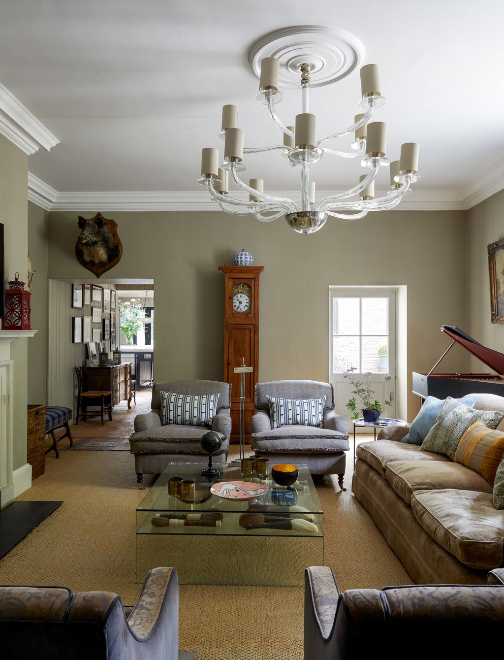 Lesley designed the librarys chandelier and had it made in Murano Venice. Her husband made the harpsichord himself. They...