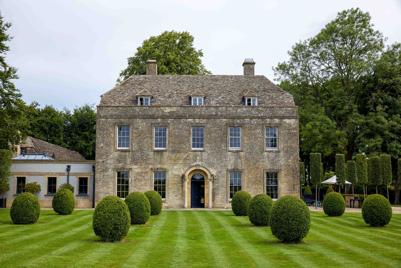 A graceful Georgian rectory set in five acres of gentle Gloucestershire landscape