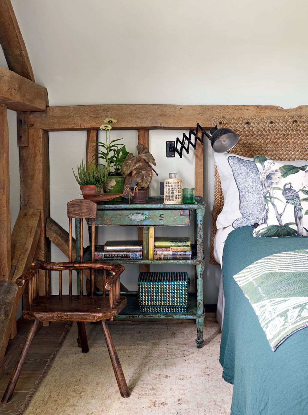The blues and greens of a metal factory table from Brussels an Indian throw from The Cloth Shop and House of Hackneys...
