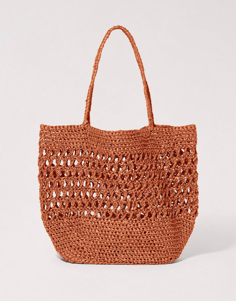 Million Reasons Bag 44 from Wool and the Gang.  buttongroup  SHOP NOW