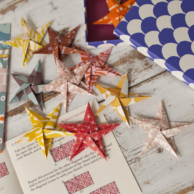 Image may contain Paper Star Symbol Symbol Art Origami Brochure Advertisement Flyer and Poster