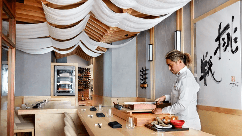 Image may contain Human Person Restaurant Indoors Room and Shop