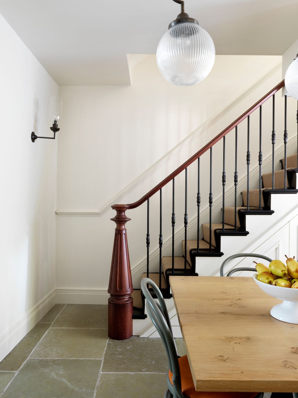 Image may contain Room Indoors Living Room Interior Design Wood and Staircase