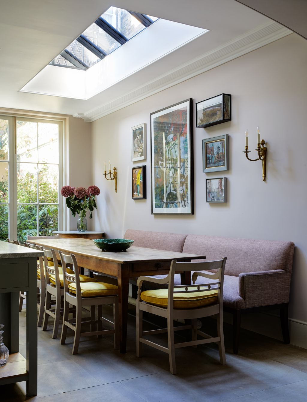 Image may contain Furniture Chair Window Architecture Building Room Indoors Interior Design Dining Table and Table