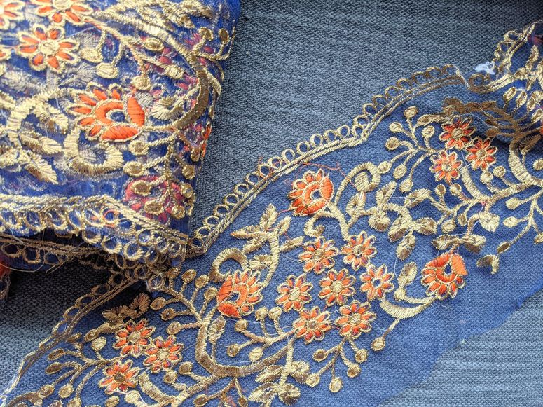 Image may contain: Pattern, Embroidery, and Rug