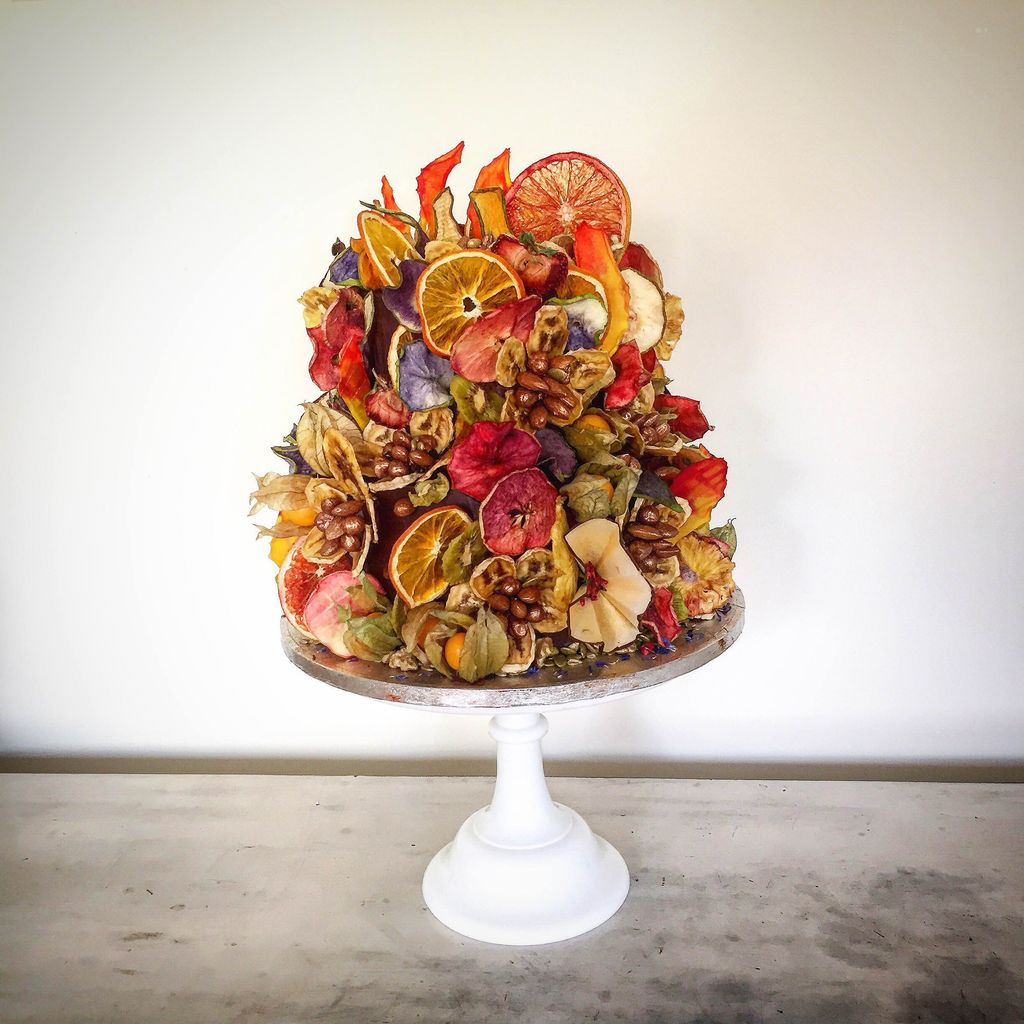 Image may contain Furniture Tabletop Plant Food Sweets Confectionery Flower Flower Bouquet and Flower Arrangement