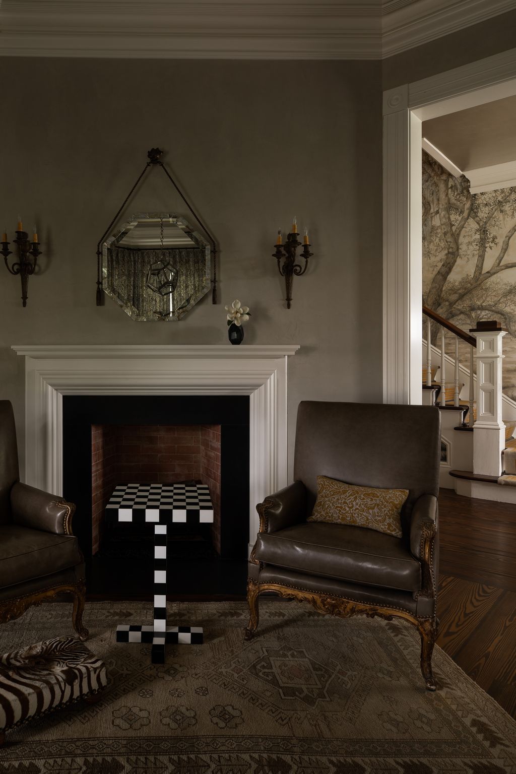 Image may contain Furniture Indoors Living Room Room Fireplace Interior Design Rug and Hearth