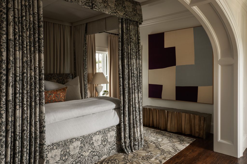 Image may contain Room Bedroom Indoors Furniture Interior Design Flooring Floor Bed Living Room and Wood