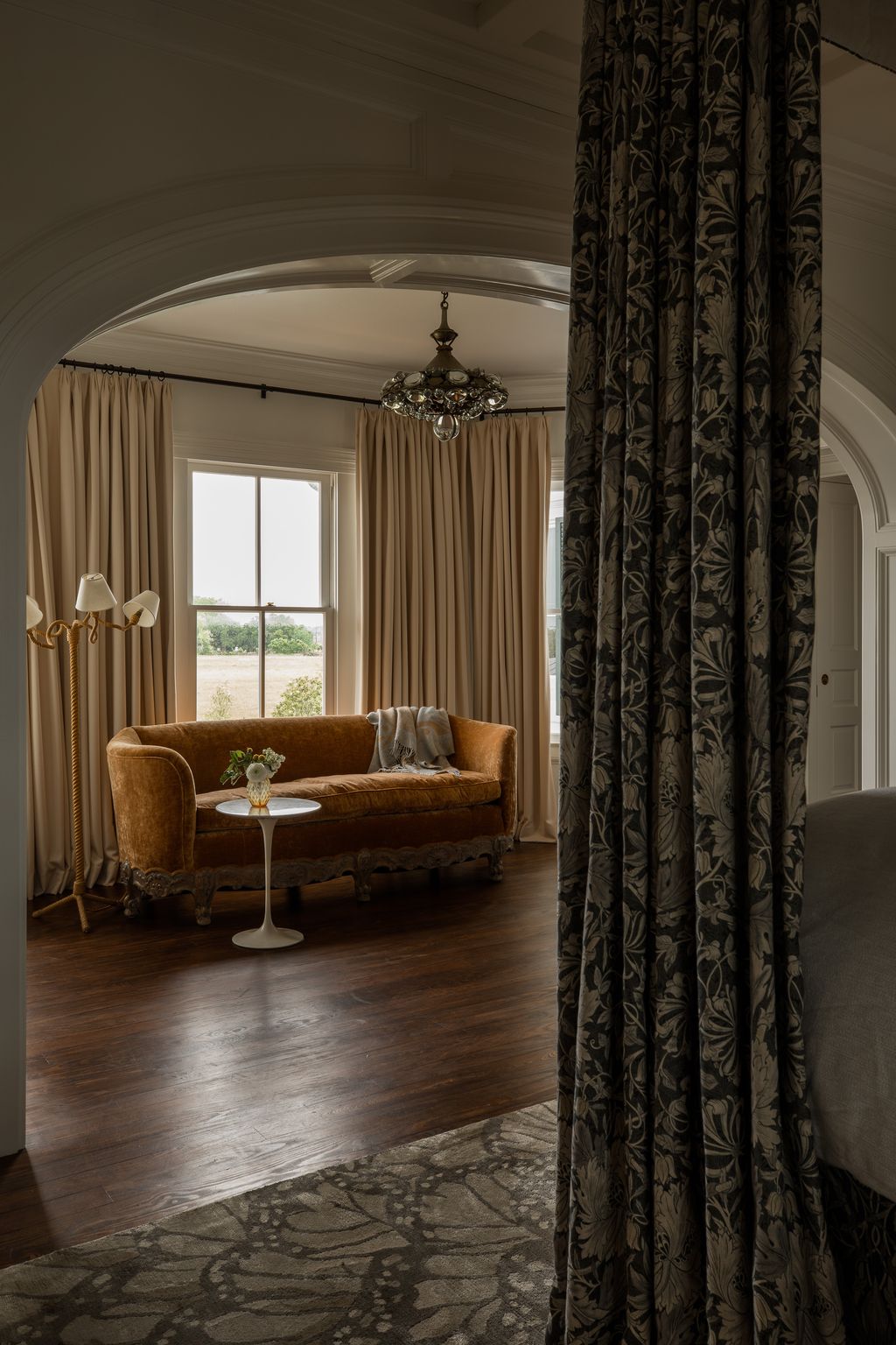 Image may contain Flooring Floor Couch Furniture Living Room Indoors Room Wood Interior Design and Home Decor