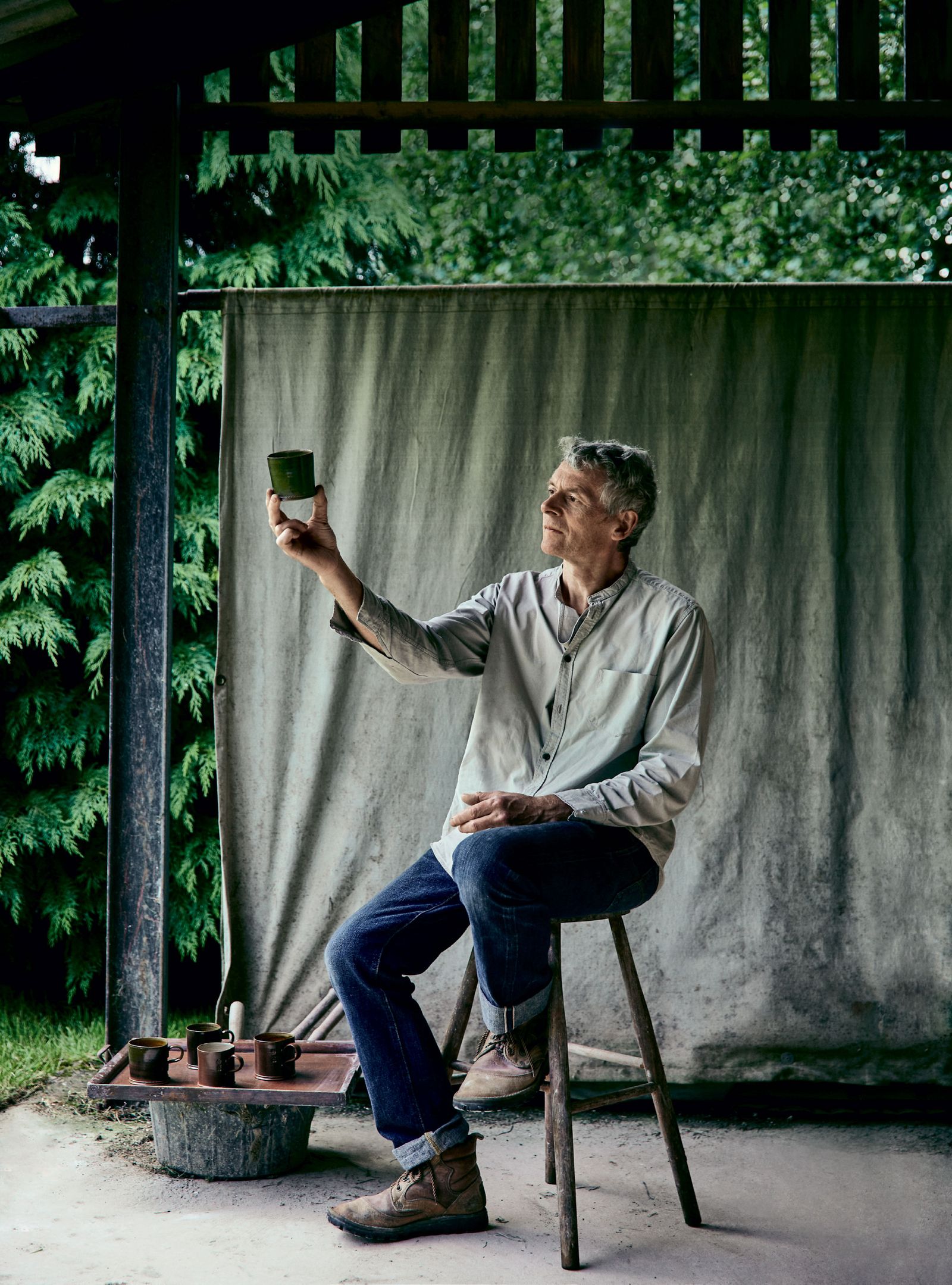 Image may contain Human Person Clothing Shoe Footwear Apparel Furniture and Pants