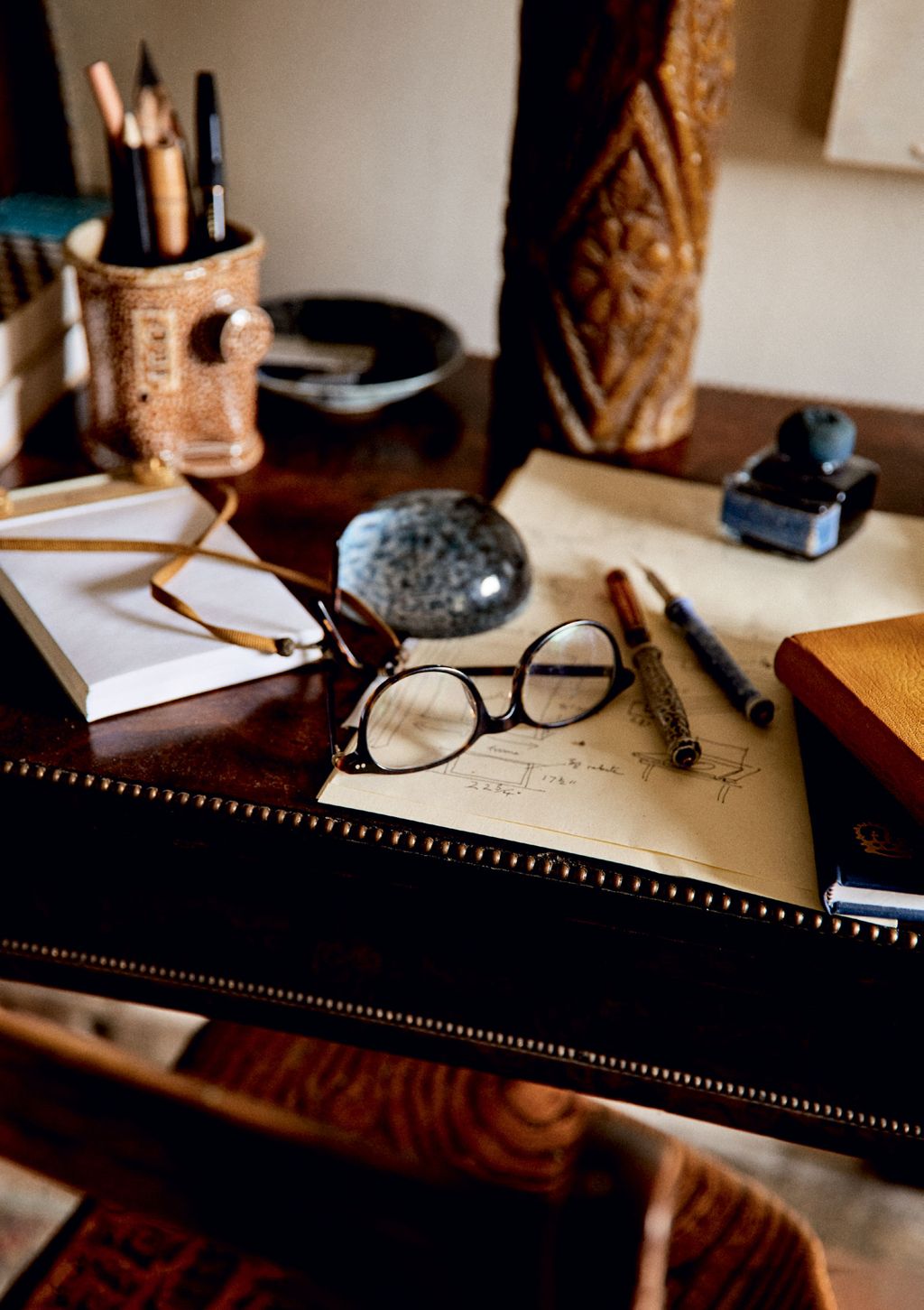 Image may contain Furniture Table Glasses Accessories Accessory Tabletop and Desk