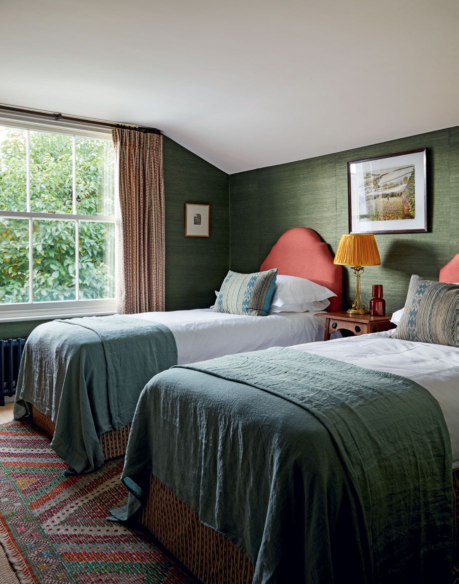 Image may contain Indoors Room Bedroom Furniture Bed and Dorm Room