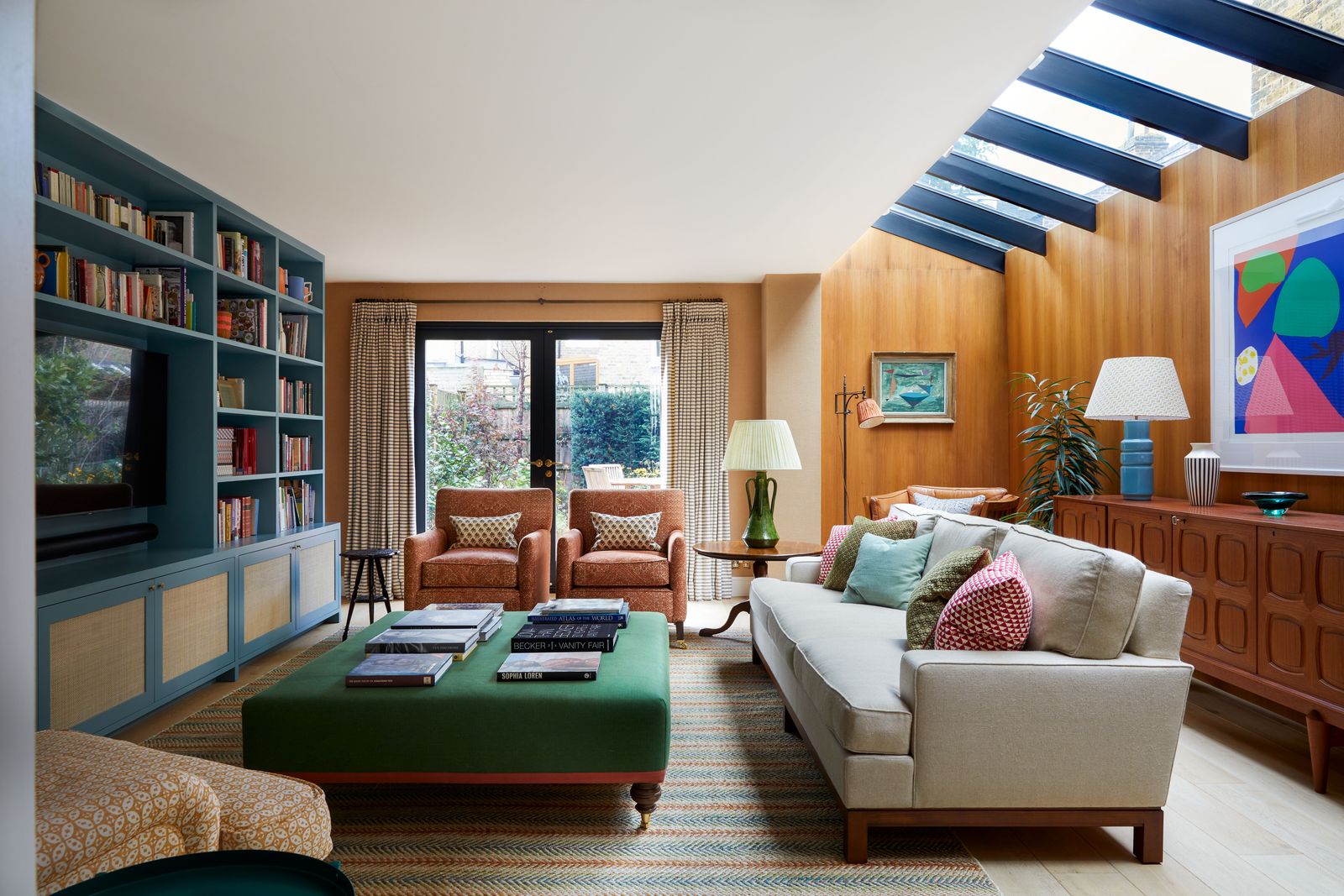 Image may contain Furniture Interior Design Indoors Living Room Room Couch Chair Housing Building Table and Rug