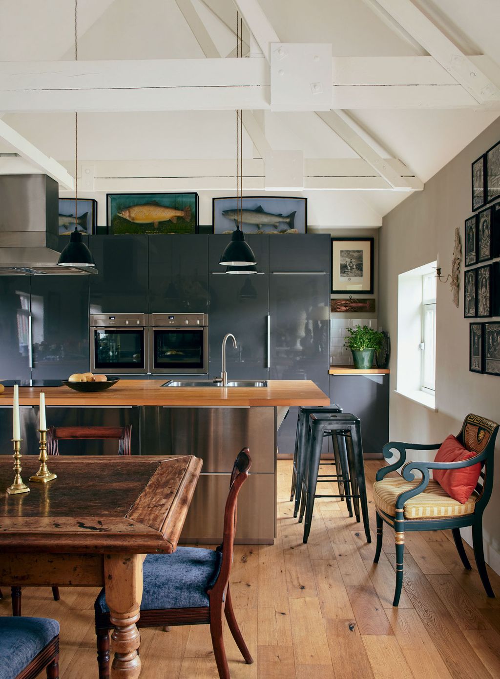 Image may contain Room Indoors Furniture Chair Wood Kitchen Hardwood and Interior Design