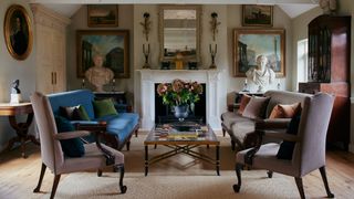 Image may contain Living Room Room Indoors Furniture Augustus Couch Antoninus Pius Human Person Chair and Flooring