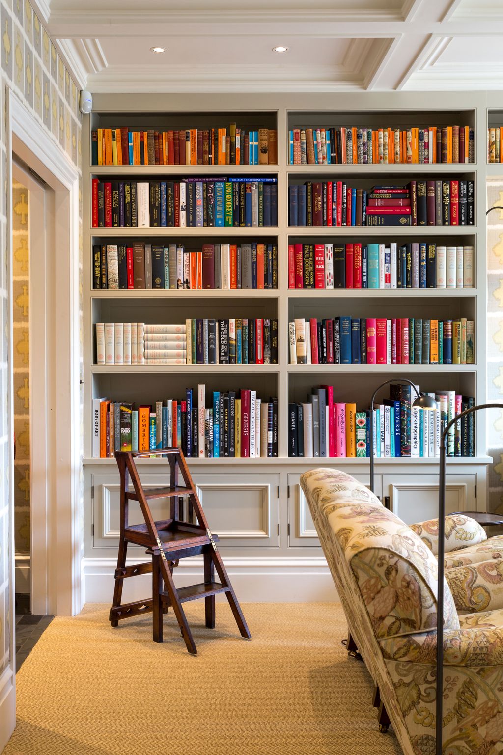 Image may contain Furniture Bookcase Indoors Room Shelf Library and Book