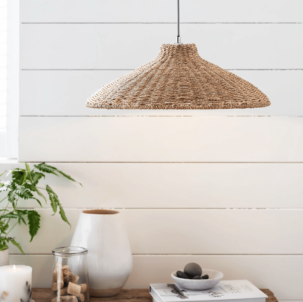 Image may contain Lamp and Lampshade