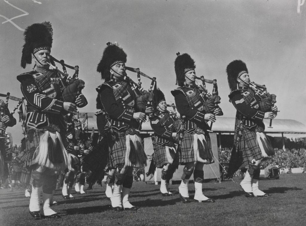 Image may contain Human Person Leisure Activities Clothing Apparel Musical Instrument Bagpipe and Musician