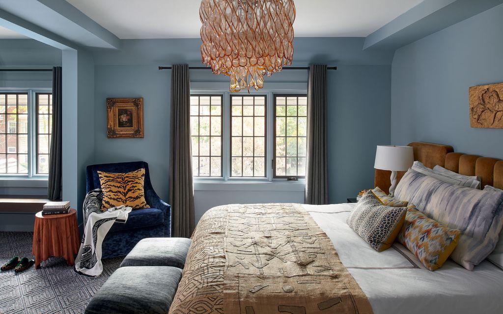 Image may contain Furniture Indoors Room Bedroom Living Room Interior Design and Bed