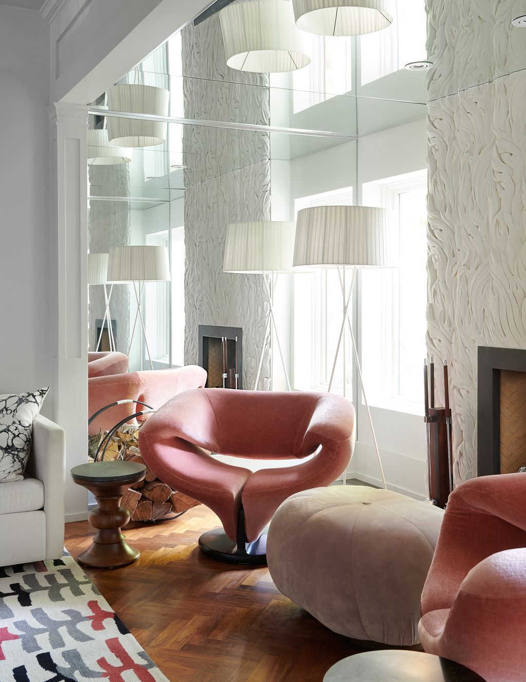 Image may contain Furniture Living Room Indoors Room Table Couch Coffee Table and Rug