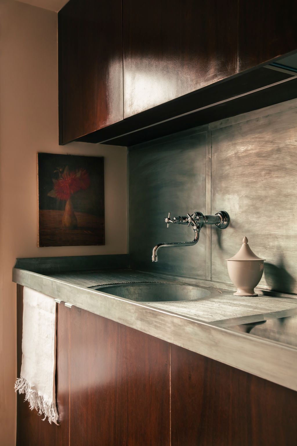 Image may contain Sink Faucet and Indoors