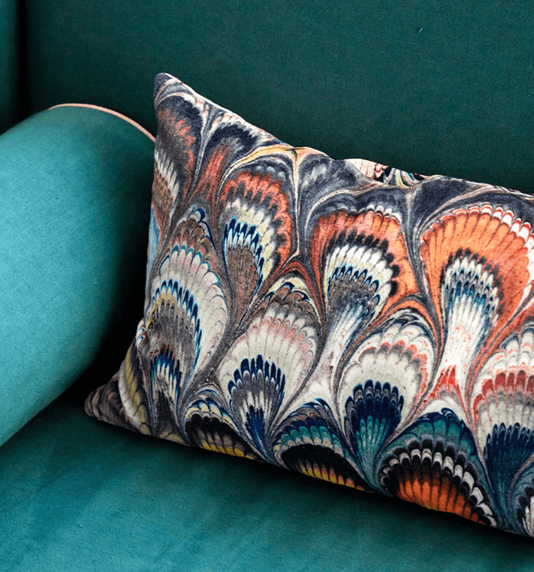 Image may contain: Cushion, Pillow, Clothing, Shoe, Footwear, and Apparel