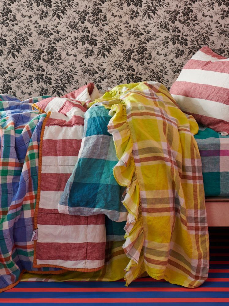 Image may contain: Furniture, Bed, and Cushion