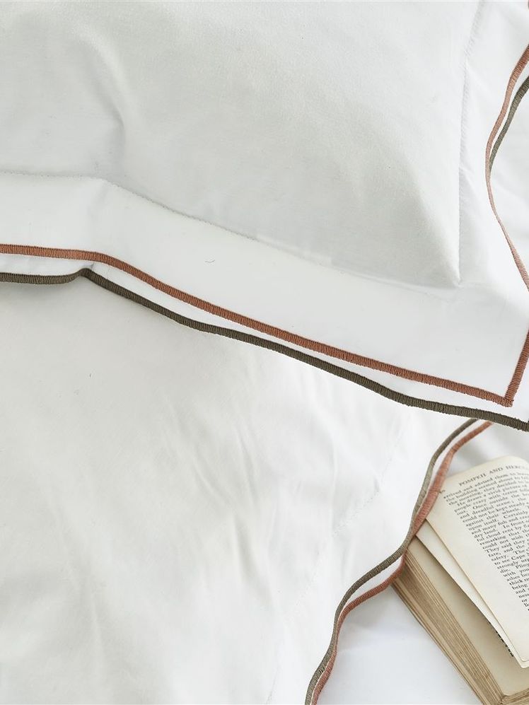 Image may contain: Cushion, Pillow, Home Decor, Linen, Text, and Page