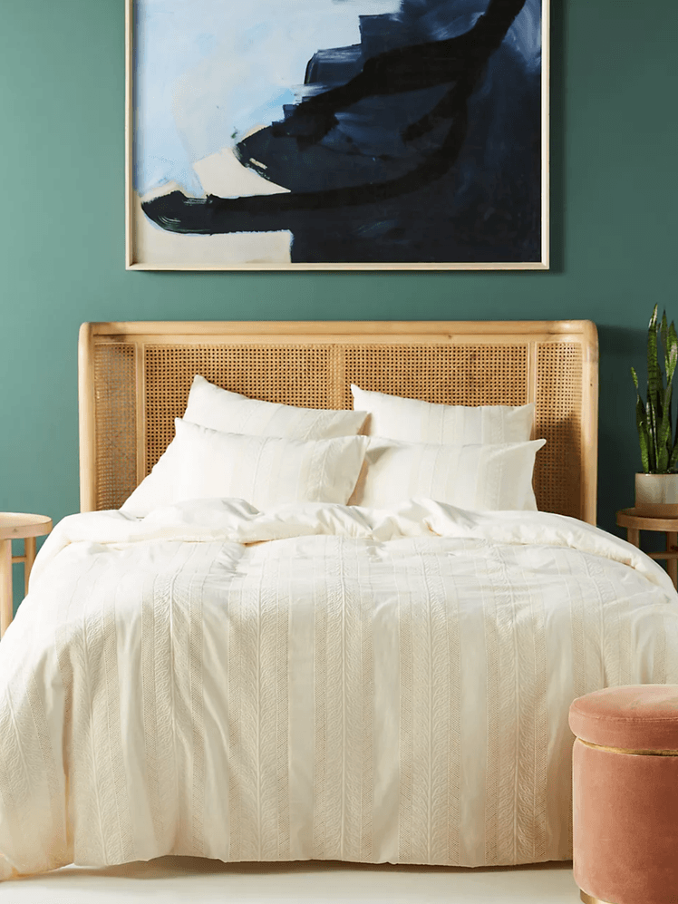 Image may contain: Home Decor, Furniture, Linen, Cushion, Bed, Interior Design, Indoors, Room, and Bedroom