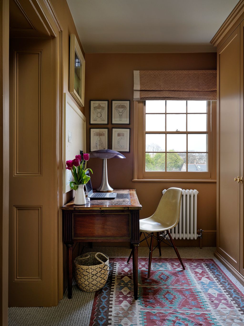 Image may contain Furniture Rug Table and Chair