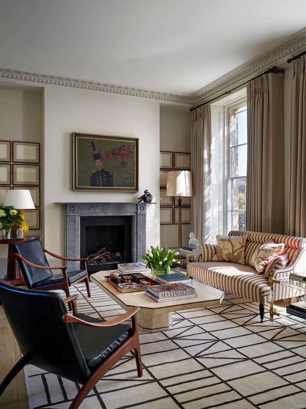 Image may contain Furniture Chair Living Room Room Indoors Book Interior Design Couch Table and Flooring