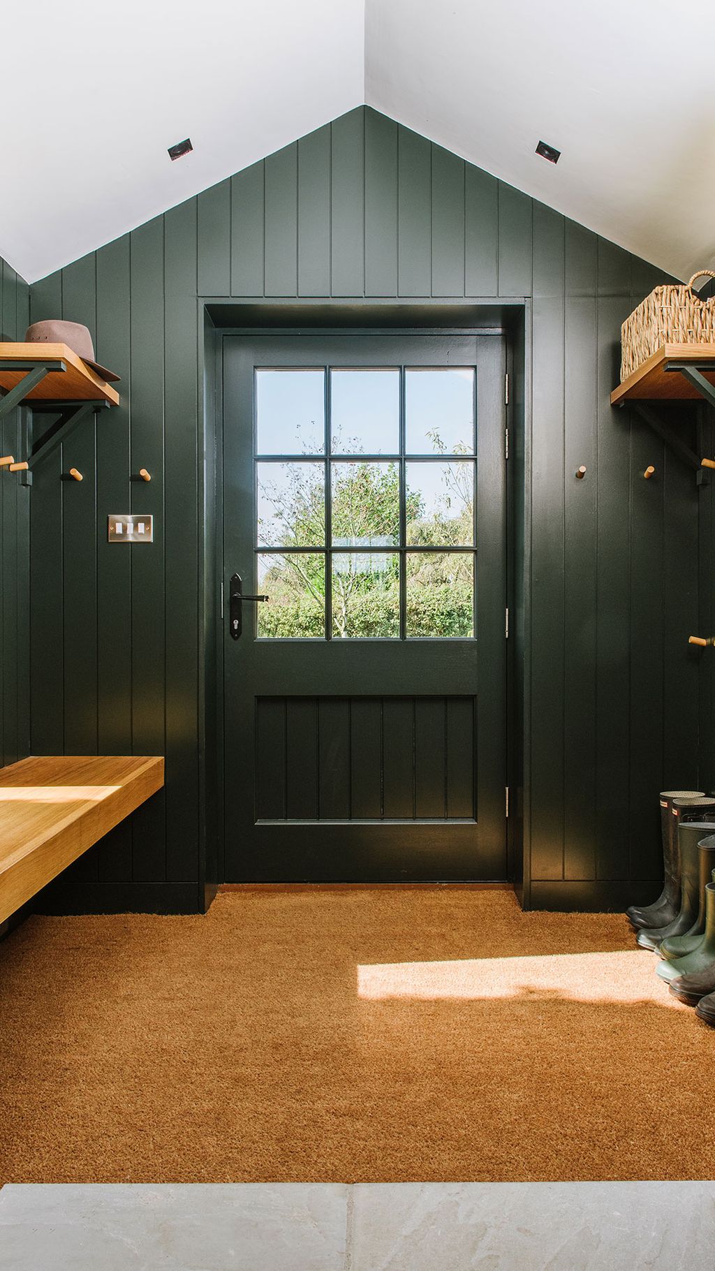 Image may contain Wood Door Flooring Hardwood Rug Furniture and Plywood