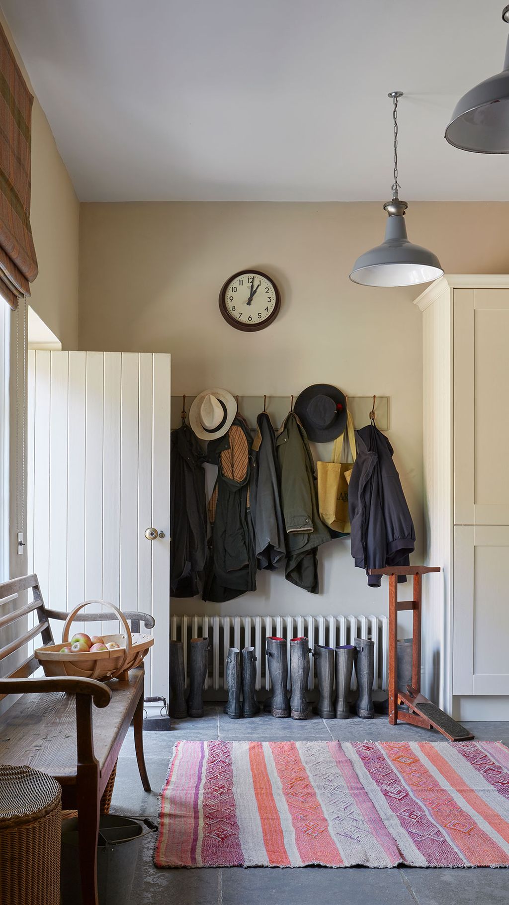 Image may contain Furniture Coat Rack Clock Tower Architecture Tower Building Chair and Rug