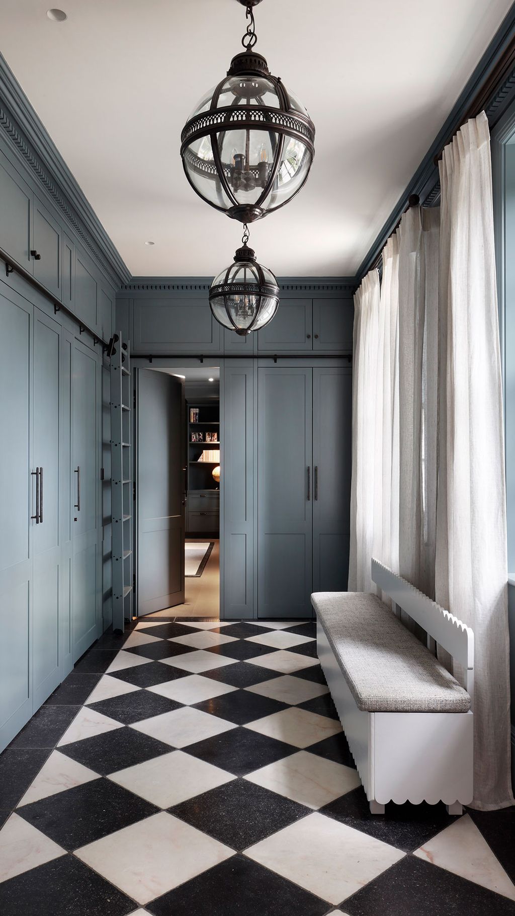 Image may contain Flooring Indoors Building Housing Floor Corridor Furniture Room Interior Design and Rug