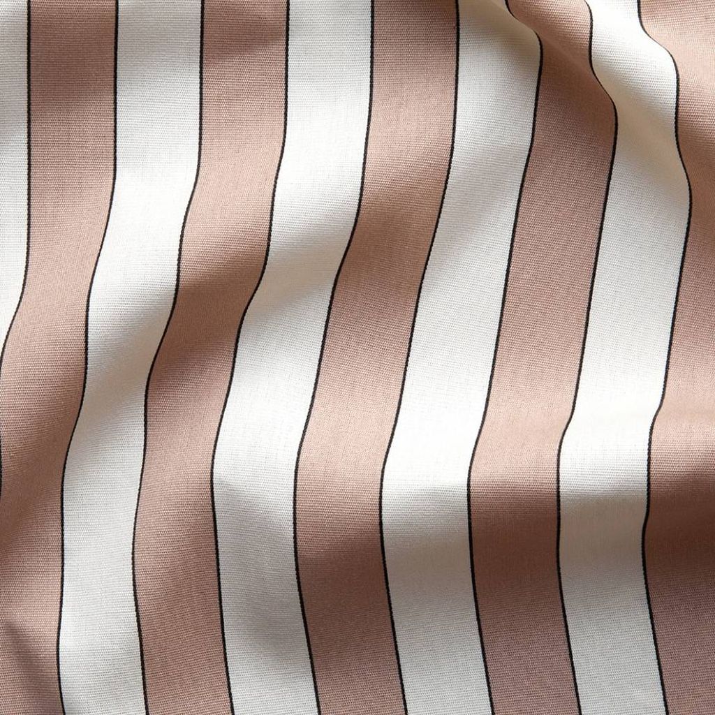 Image may contain Tablecloth Home Decor and Linen