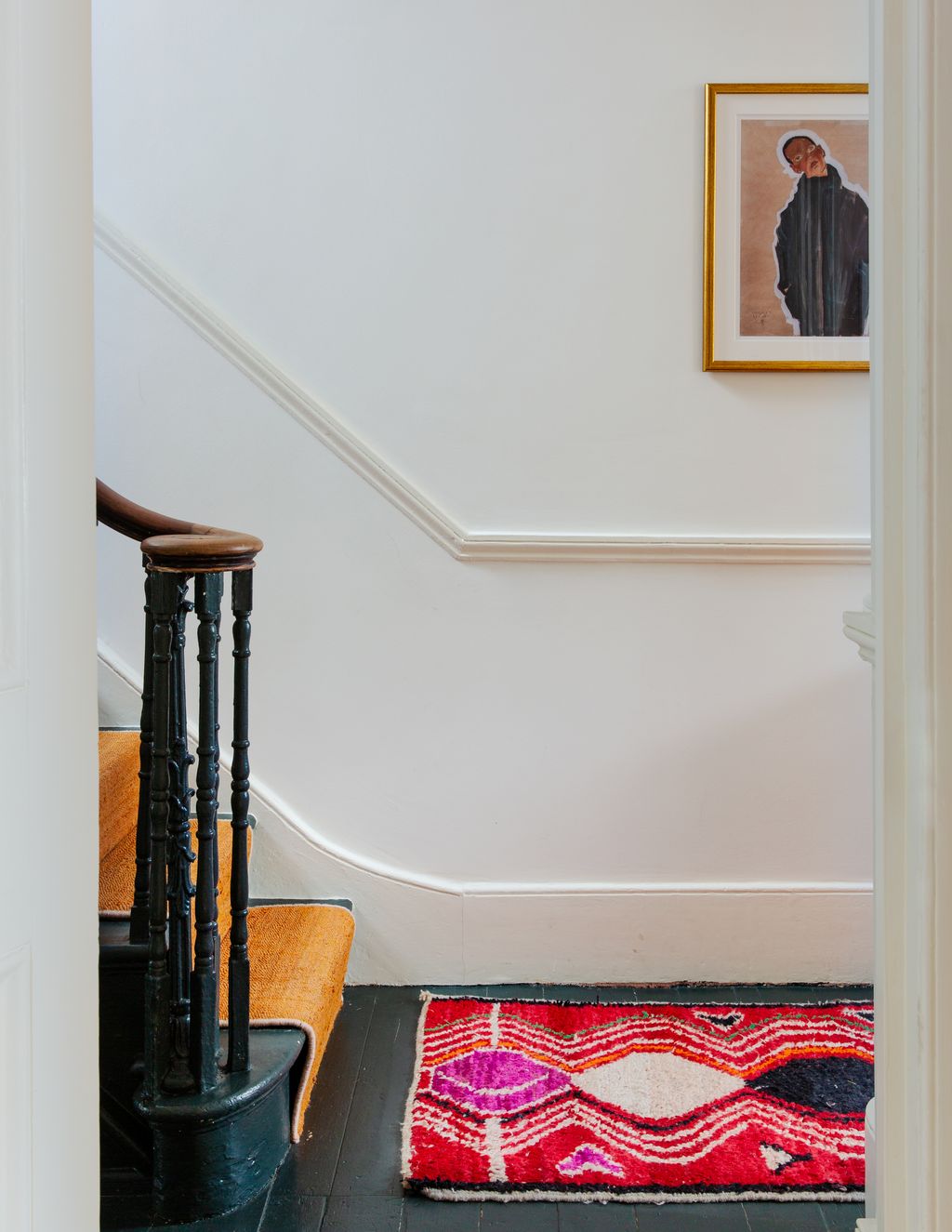 Image may contain Banister Handrail Rug Human and Person