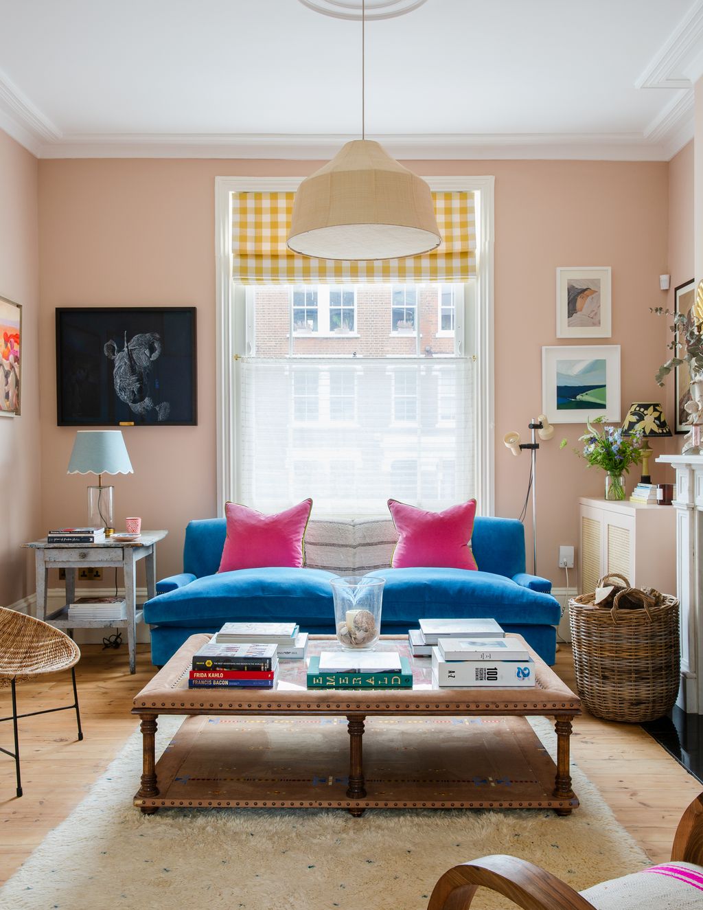 Image may contain Furniture Living Room Room Indoors Table Couch Coffee Table Rug Cushion and Pillow