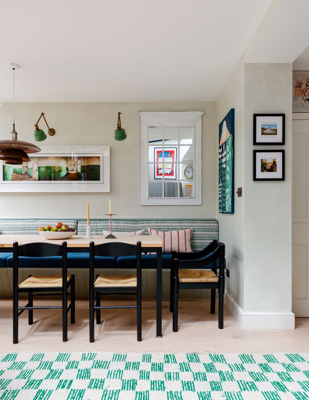 Image may contain Indoors Room Furniture Chair Rug Interior Design Dining Table Table Kitchen and Dining Room