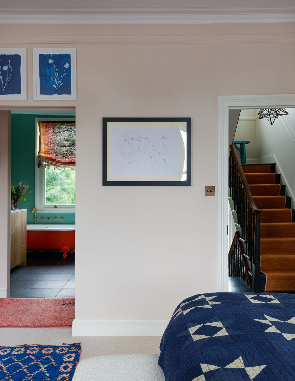 Image may contain Interior Design Indoors Room Living Room Banister Handrail Flooring Staircase Floor and Bedroom