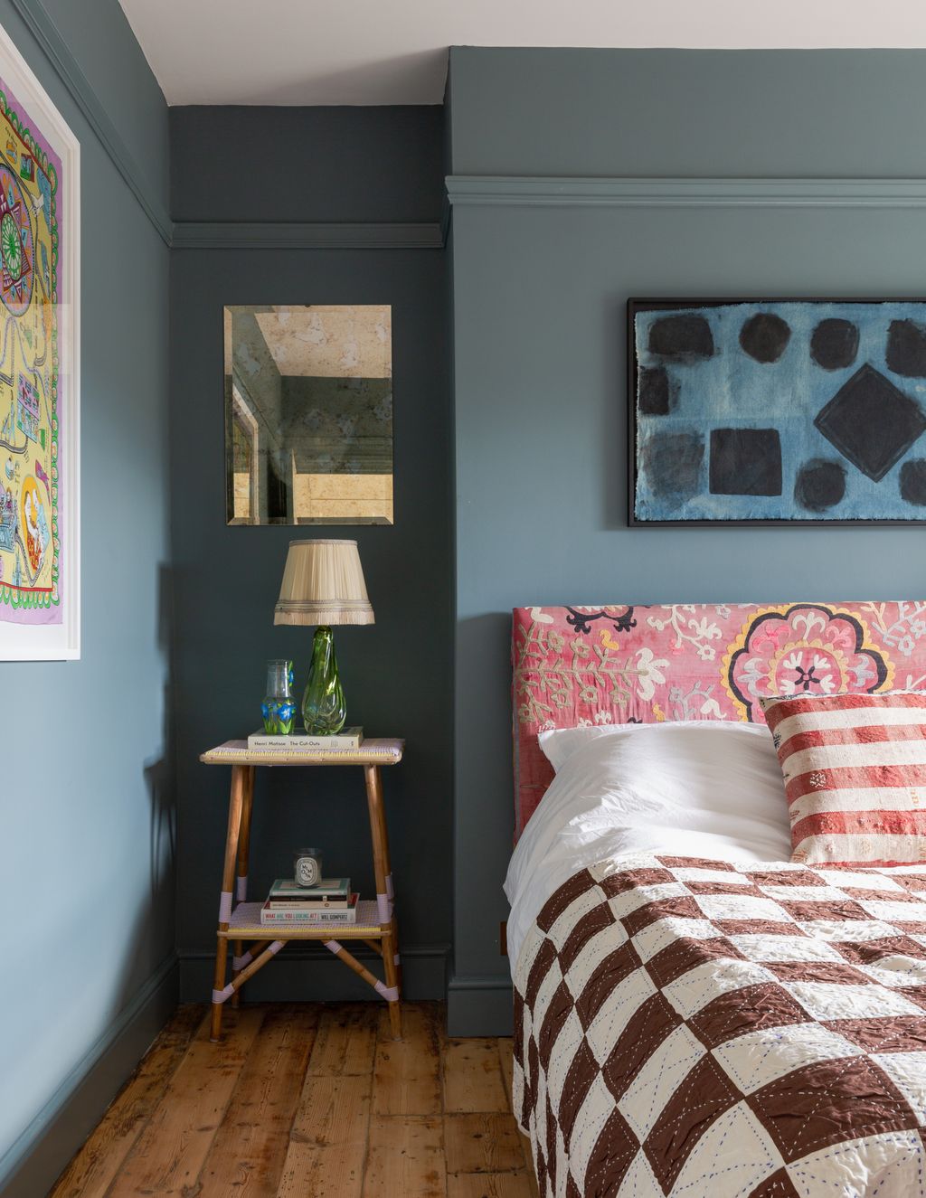 Image may contain Interior Design Indoors Room Wood Furniture Bed Bedroom and Flooring