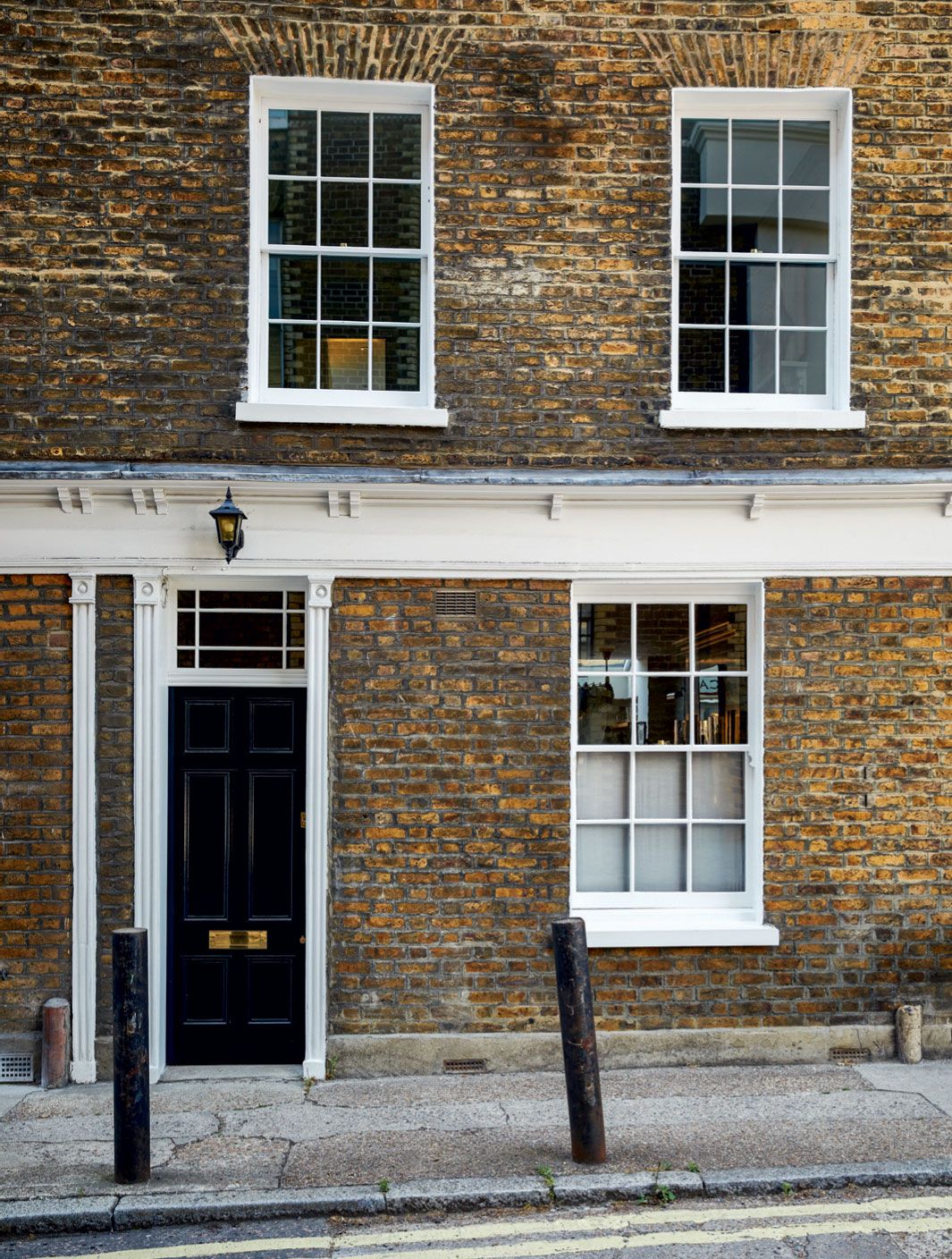 Image may contain Door Brick Walkway Path and Window