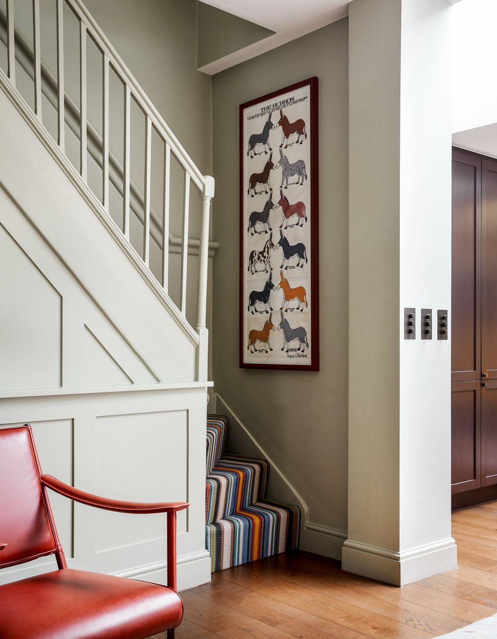 Image may contain Banister Handrail Furniture Interior Design Indoors Flooring Wood Chair and Staircase