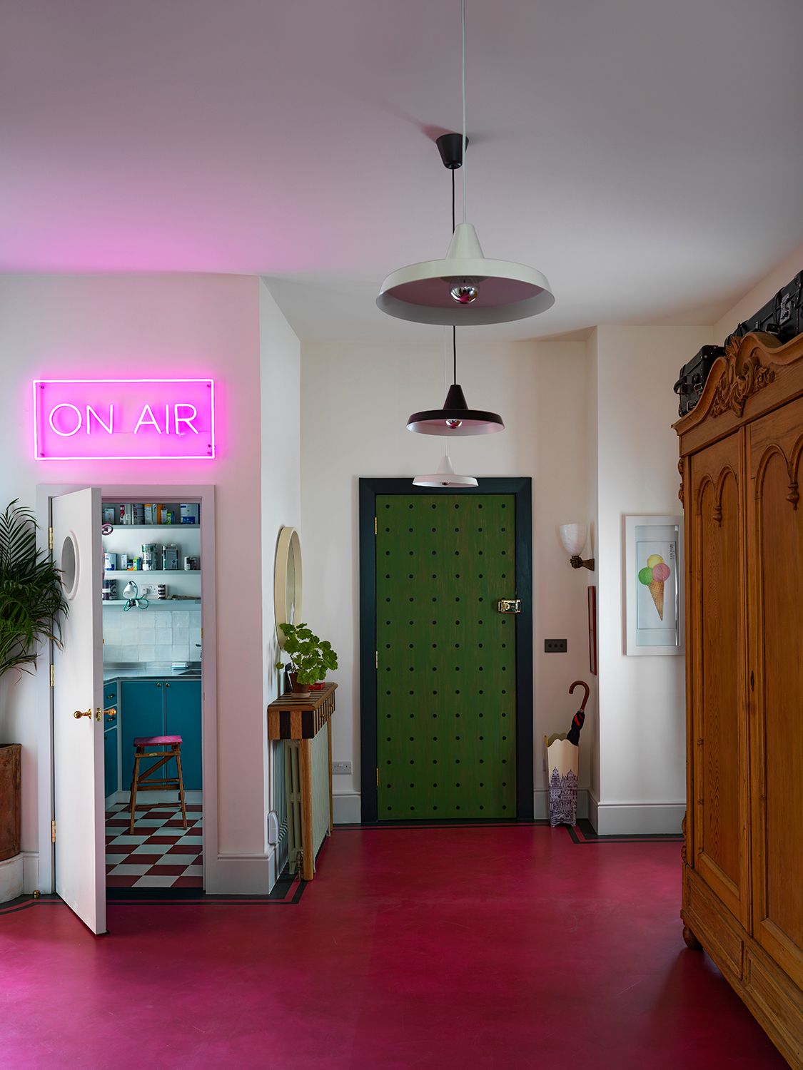 Image may contain Flooring Floor Interior Design Indoors Furniture Wood Hardwood Living Room Room Shelf and Corner